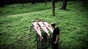In harsh bdsm, three teenage slaves are punished and humiliated.