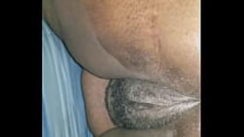 Large ebony, greased ass