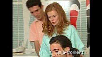 A gorgeous redhead amateur with a lot of hair is making her first threesome love.