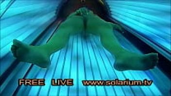A lovely woman with large, lovely breasts masturbates in front of the www.solarium.tv