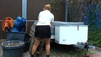 Big, firm dick handled by a sexy, mature blond with stockings and glasses
