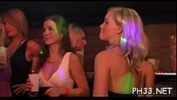 A hardcore gang performs in a nightclub.