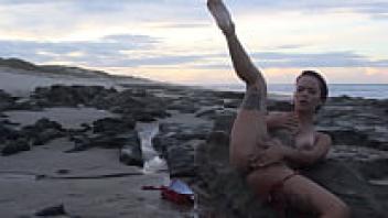 Cumming on the shore