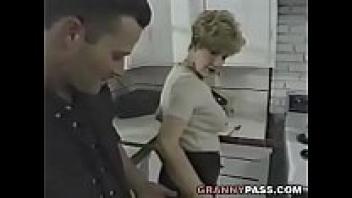 Young Dick in the kitchen is adored by Granny.
