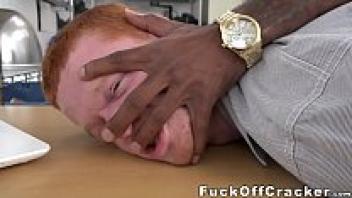 A redhead man with a huge black dick who is enticed by financial pleasures
