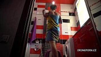 Voyeur Anna in the restroom