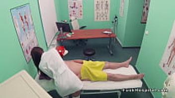 A nurse gives the doctor a massage before intercourse.