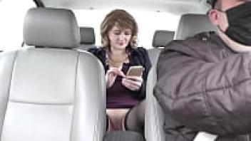under a skirt without underwear in public. Sexy blond Milf Frina, who neglected to wear underwear, is transported in the back seat of a taxi by the driver.