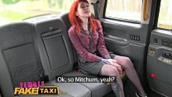Redhead with tattoos is dominated by a female fake taxi lesbian.