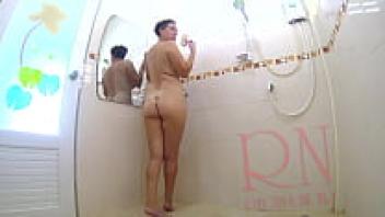 Wearing shorts and a T-shirt, the girl takes a shower bath. Take a nude shower. COMPLETE