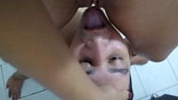 After being creampied by a black man, her cuckold husband has to wipe up her pussy.