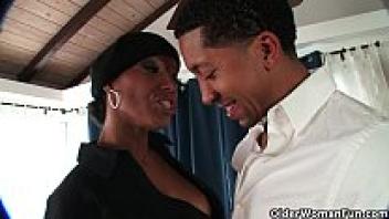 A cumshot is taken by an ebony milf