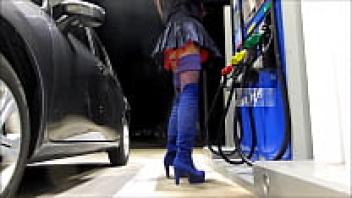 Mini skirt worn by a transvestite in public at a gas station